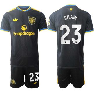 Manchester United Tredjeställ Herr 2025/26 Luke Shaw #23 Kortärmad Fotbollströja + Shorts