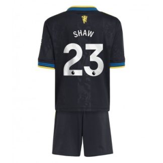 Manchester United Barn Tredjeställ 2025/26 Luke Shaw 23 Kortärmad Tröja + Shorts